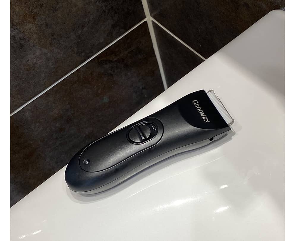 Black GroomenUK NoNick trimmer on the edge of the sink